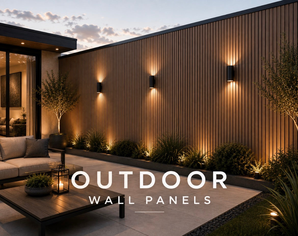 Outdoor Wall Panels - modern patio with dark timber cladding, wall-mounted lights and landscaped garden at dusk