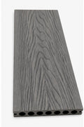 Grey composite decking board close-up showing wood grain texture