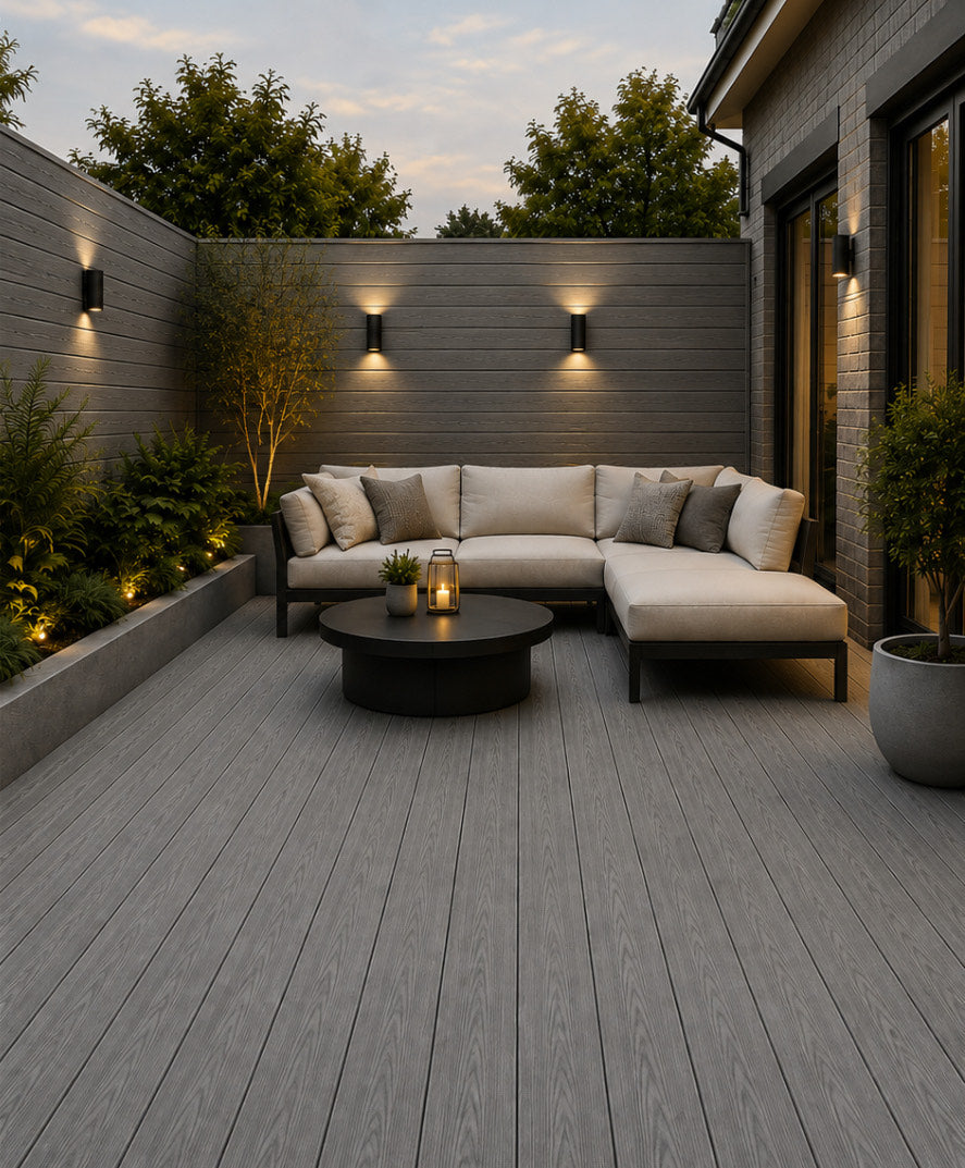 Grey composite decking board installed on outdoor patio