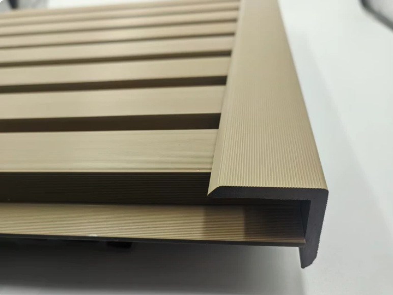 Khaki exterior cladding strip installed view